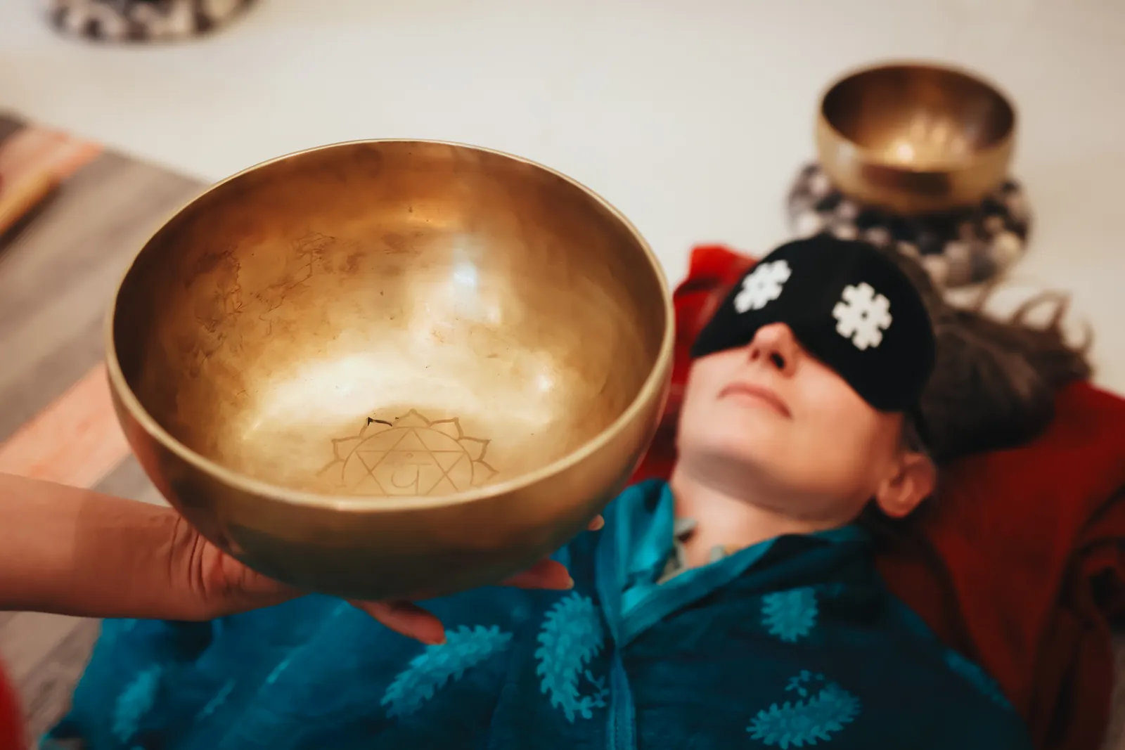 Student practising singing bowl technique